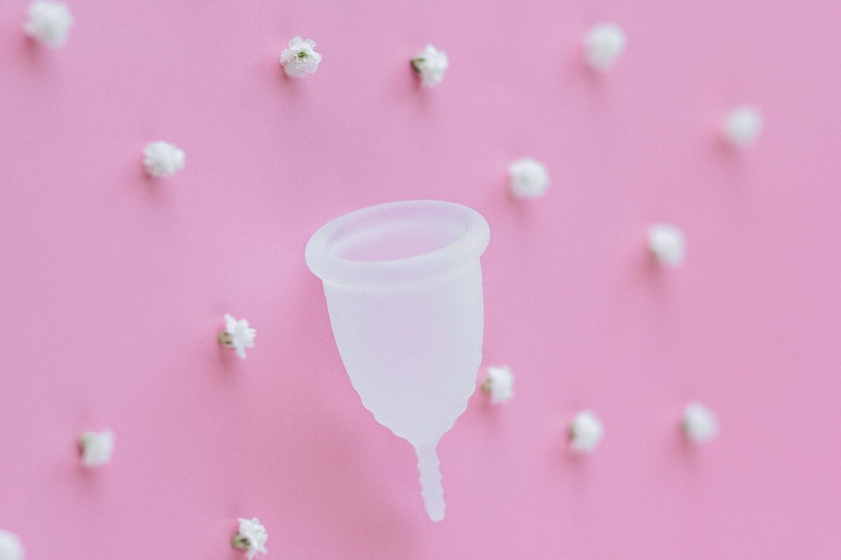 A Menstrual Cup on a Pink Surface