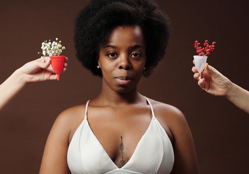 A Woman with Afro Hair Wearing Bra