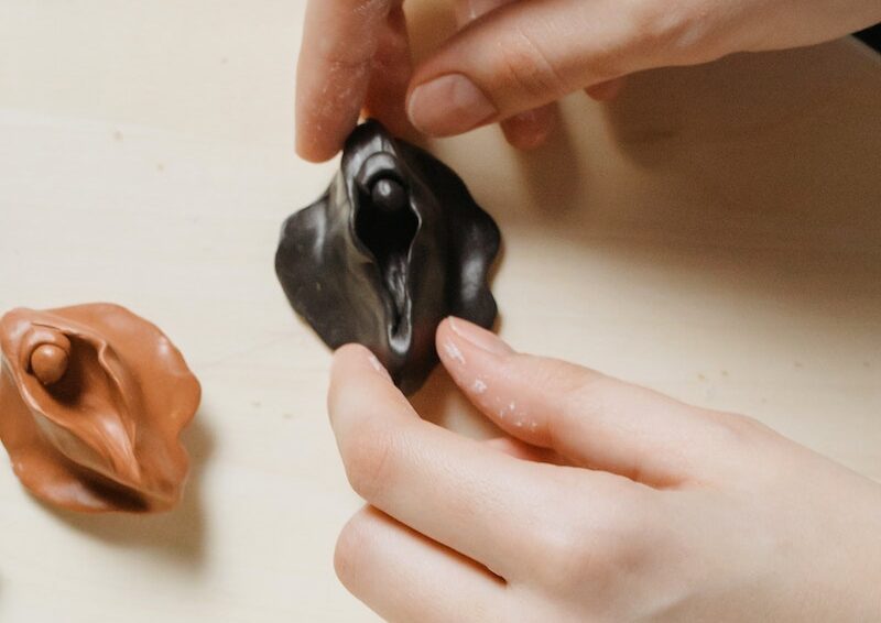 A Person Shaping a Clay